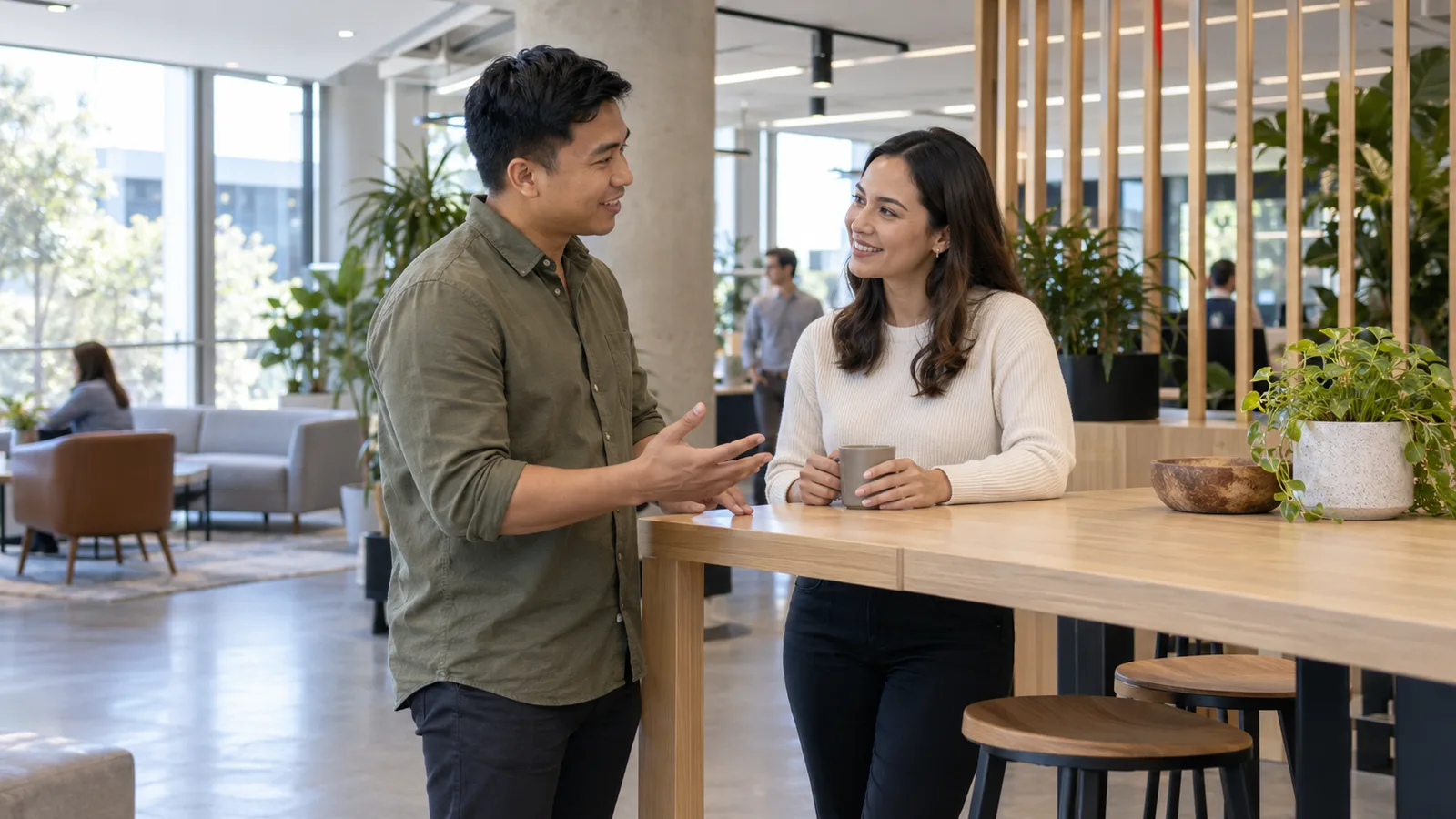 A Filipino professional and colleague discuss changing tasks in a Sydney office.